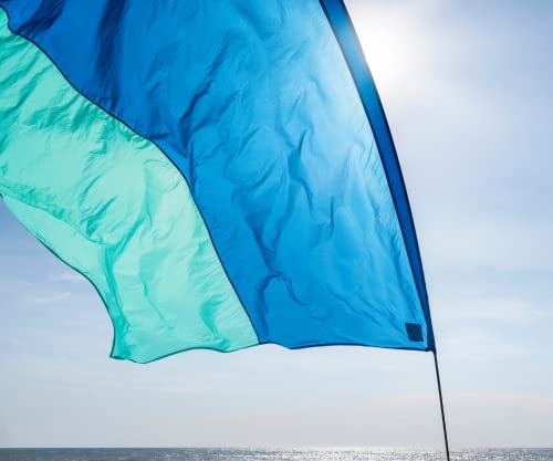 Essentials: Shibumi Shade® - World's Best Beach Shade. Designed and Sewn in America. The Original Wind Powered Beach Shade.