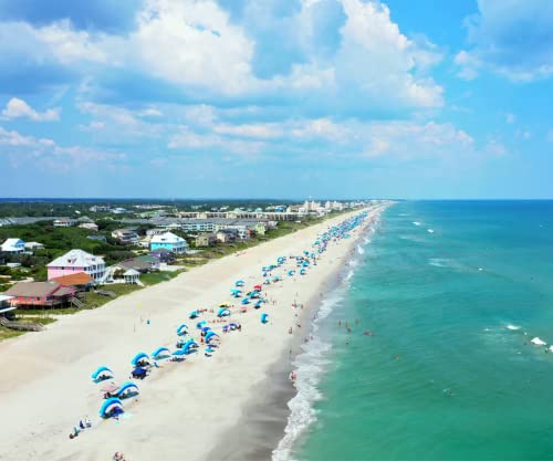 Essentials: Shibumi Shade® - World's Best Beach Shade. Designed and Sewn in America. The Original Wind Powered Beach Shade.