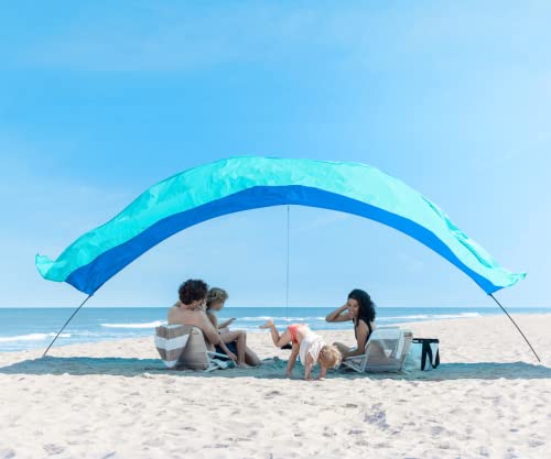 Essentials: Shibumi Shade® - World's Best Beach Shade. Designed and Sewn in America. The Original Wind Powered Beach Shade.