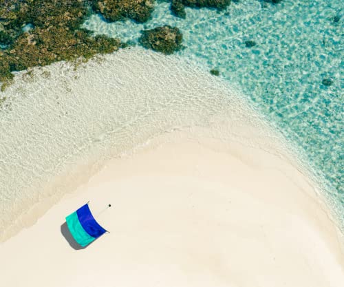 Essentials: Shibumi Shade® - World's Best Beach Shade. Designed and Sewn in America. The Original Wind Powered Beach Shade.