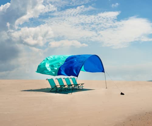 Essentials: Shibumi Shade® - World's Best Beach Shade. Designed and Sewn in America. The Original Wind Powered Beach Shade.